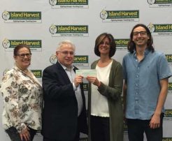4 people awarded with a check