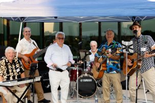 band playing outside at the summer celebration