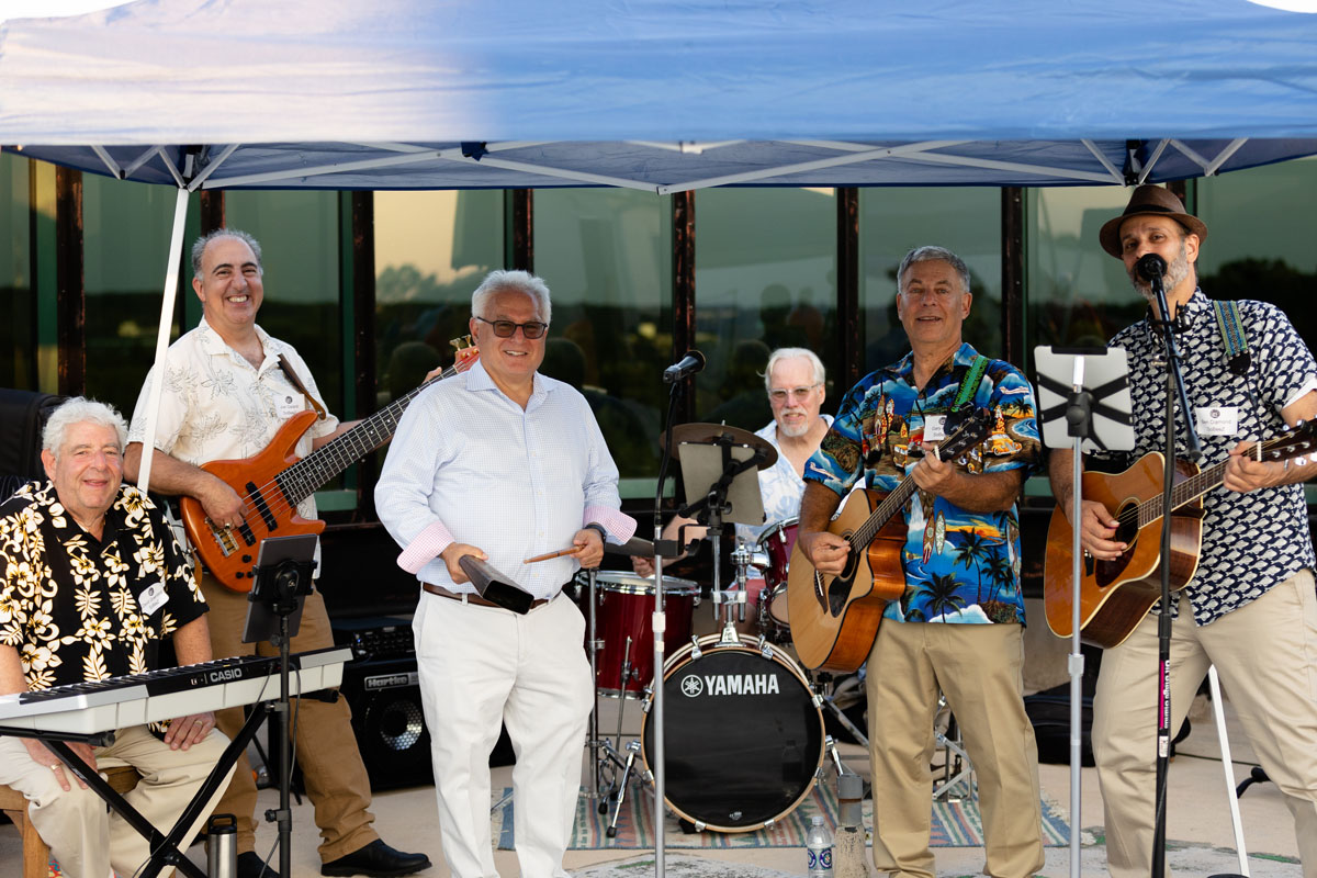 band playing outside at the summer celebration